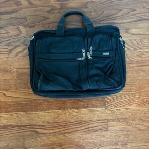TUMI Black Travel Bag